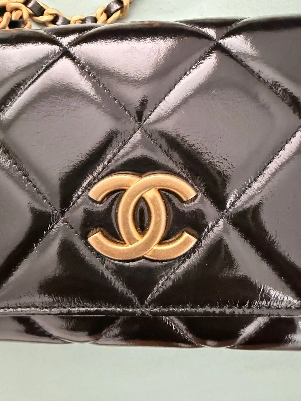 CHANEL Black Quilted Patent Leather Mini Flap with Gold Hardware